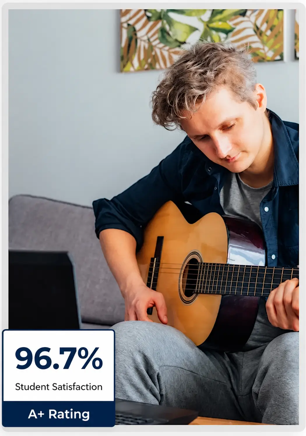 A man playing acoustic guitar